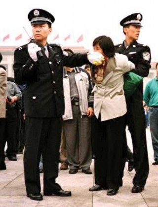 Photo: Falun Gong Practitioner Arrested in Tiananmen Square, Beijing, China.