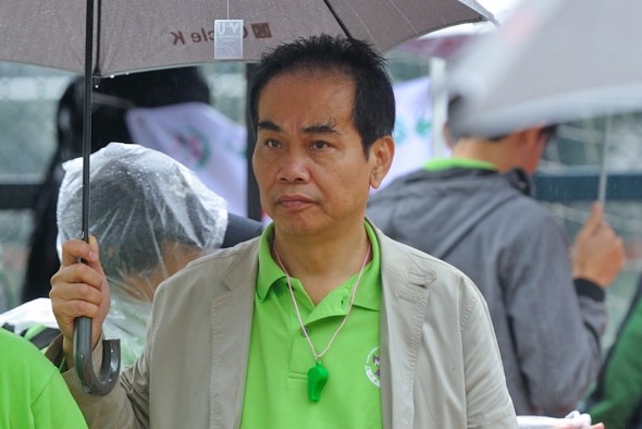 Hung Waiseng, the current Managing Director of mainland-funded Beijing Yanjing Brewery, is pictured at an event organized by the Hong Kong Youth Care Association Limited, a Communist Party front group in which he plays a leadership role. (Song Xianglong/The Epoch Times)