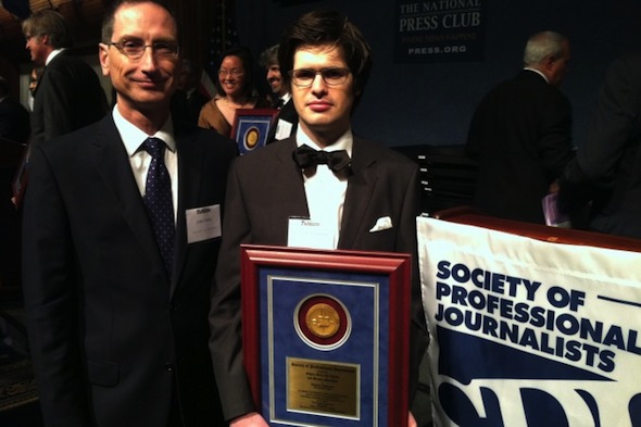 John Nania (l), editor-in-chief of the Epoch Times, with award-winning reporter Matthew Robertson at the National Press Club in Washington, D.C., June 22, 2013. Robertson was recognized for excellence in reporting for his series on forced, live organ harvesting in China. (Genevieve Belmaker/Epoch Times)