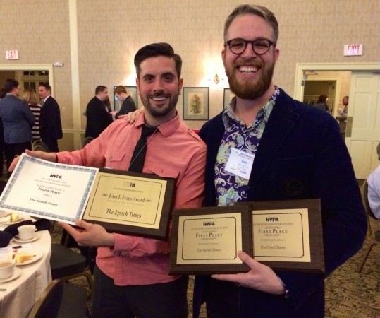 Epoch Times Creative Director Seth Holehouse and Associate Creative Director Robert Counts hold awards for overall excellence in photography, design, and advertising at the New York Press Association's annual conference in Saratoga Springs, N.Y., Saturday. (Epoch Times)