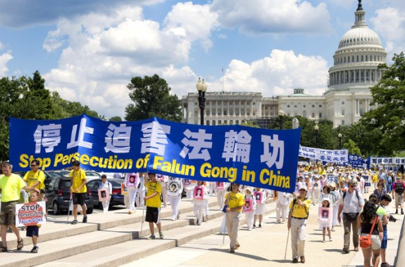 Falun Gong demonstrators march on Capitol Hill in Washington July 17th. Photo: Getty Images