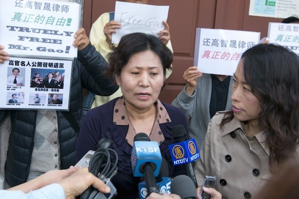 The wife of Gao Zhisheng, Geng He, speaks to reporters at a news conference held in the Bay Area, California, on Aug. 7. Gao Zhisheng, one of China's most prominent rights lawyers, was recently released from prison but is not yet free from official surveillance and control. (Ma Youzhi/Epoch Times)