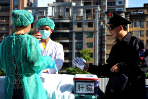 Falun Gong members act out a scene during a demonstration in Taipei July 20th.