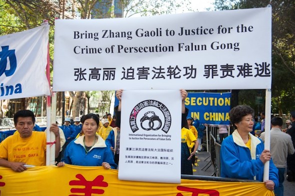 Falun Gong practitioners stage a peaceful protest against China's Vice Premier Zhang Gaoli, who is believed to be guilty of genocide, torture, and other crimes against humanity, during the Climate Summit at the U.N., in New York City, on Sept. 23, 2014. (Dai Bing/Epoch Times)