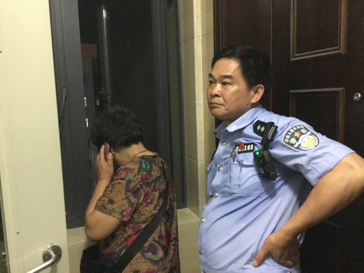 A policeman tasked with stalking Wang Zhiwen. (Courtesy of Danielle Wang) 