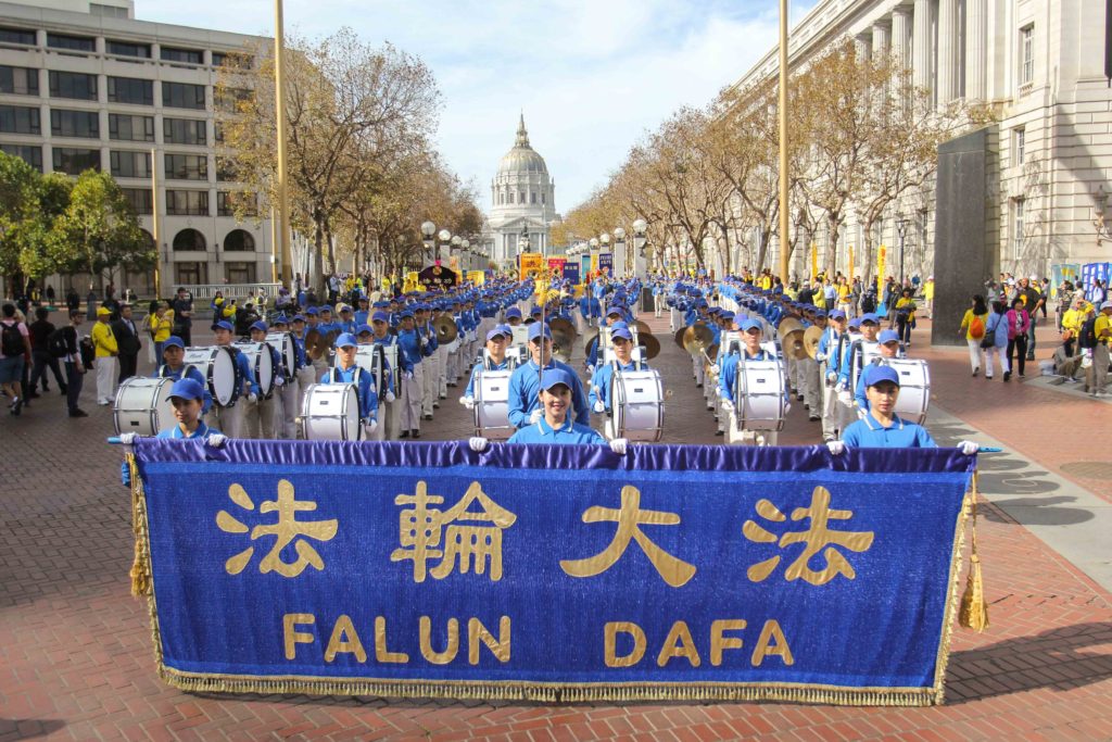 Over 5,000 practitioners and supporters of Falun Gong from over 30 countries march in a parade in San Francisco on Oct. 22, 2016, bringing awareness to the practice and calling an end to the persecution in China that started on July 20, 1999. (Benjamin Chasteen/Epoch Times)