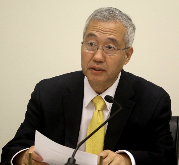 Dr. Wang Zhiyuan, president, World Organization to Investigate the Persecution of Falun Gong, speaks at a forum, May 26, on Capitol Hill, on new lists of CCP perpetrators of crimes against Falun Gong practitioners. (Gary Feuerberg/ Epoch Times)